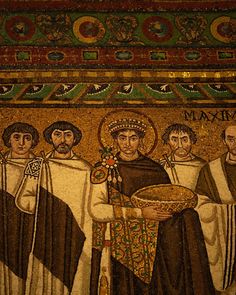 an image of some people in mosaics on the wall or floor with gold and black colors