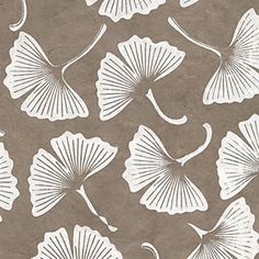a pattern with white flowers on a brown background in the shape of fan shaped leaves