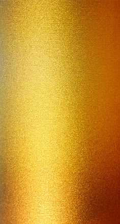 an orange and yellow background with some blurry light on it's surface,