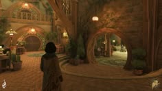 a person standing in front of a building with trees and plants on the outside wall