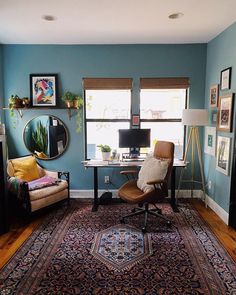 a living room filled with furniture and a rug