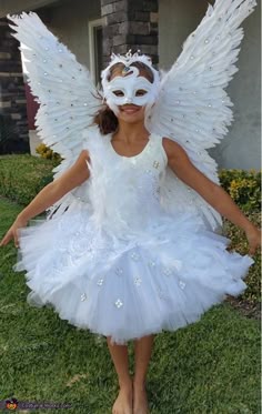 Ashley: This is my daughter Zia, she is wearing a Swan costume created by me. I bought the wings, leotard, and mask on Amazon, and added rhinestones, lace, lights and feathers... Angel Costume Ideas Diy, Fashion Designer Costume For Kids, Diy Angel Costume Ideas, Kids Angel Makeup Halloween, Angel Costume Diy Kids, White Dove Costume, White Swan Costume Kids, Angel Costume Pre Teen, Childrens Angel Costume