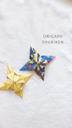 two origami stars on top of each other with the words origami shuriken written below