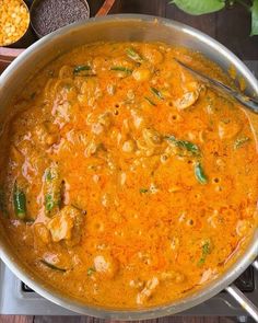 a large pot filled with food on top of a stove