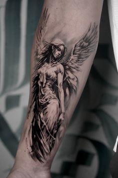 a person with a tattoo on their arm