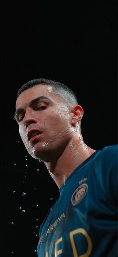 a man with his head in the air and water coming out of his face to him