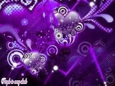 purple hearts and swirls on a black background with sparkley bubbles in the middle