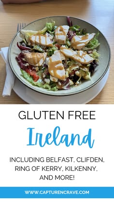 a white plate topped with chicken and salad