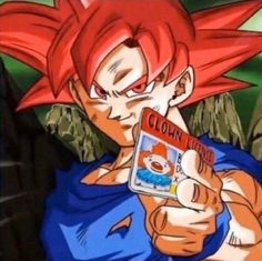 the young gohan is holding up a card
