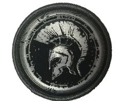 a black and white image of a roman soldier's helmet