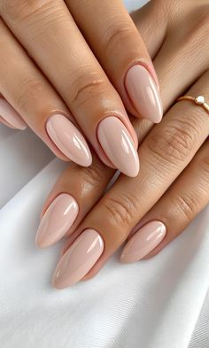Achieve timeless elegance with these glossy nude almond nails – the ultimate minimalist manicure for every season 💖 The soft beige-pink tone and clean shape make it a perfect choice for brides, professionals, and everyday glam lovers 🌸  This chic and versatile nude nail design complements any outfit and occasion, from casual to formal 👗✨  ✨ Pin now to save this stunning neutral nail inspo and take it to your next nail appointment! You can never go wrong with classic nude 💅  #NudeNails #AlmondNails #GlossyNails #NeutralNailDesign #MinimalistManicure #NailGoals #NudeManicure2025 #ClassyNails #ElegantNailDesign #EverydayNails #BridalNails Nude Beige Gel Nails, Cool Toned Nude Nails, Latte Nude Nails, Nail Colors Light, Nude Nails Beige, Nude Nails Bridesmaid, Soft Pink Nude Nails, Maternity Shoot Nail Ideas, Nails 2025 Neutral