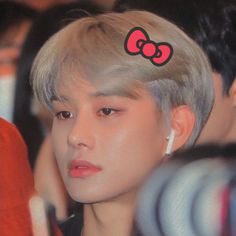 a person with a bow in their hair