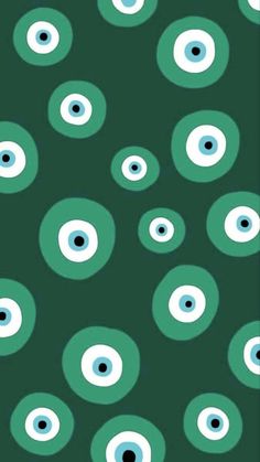 an abstract pattern with blue and green eyes on a dark green background for wallpaper