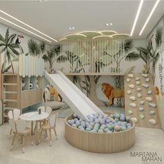 an indoor play area with slides and toys