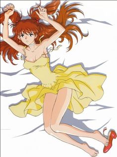 a woman in yellow dress laying on the ground with her arms up and legs spread out