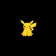 the pikachu is sitting in the dark