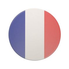a red, white and blue button with the colors of the french flag on it