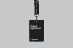 a black and white id badge with the name robert hannenson on it's side
