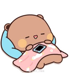 a teddy bear holding a cell phone in it's mouth while laying on the ground