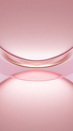 an apple logo is shown on the back of a pink background with white and red circles