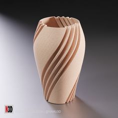 an abstract vase with wavy lines on it