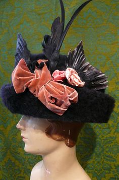 Wonderful combination of trims. Victorian Hat Pin With Feathers, Beaver Fur Top Hat, Beaver Skin Top Hat, Black Beaver Skin Top Hat, Victorian Bird Hats, Old Hat With Feather, Antique Feather Hat Style, Antique Feather Hat Design, Vintage Beaver Hat