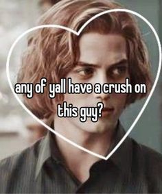 a guy that is looking at the camera and has his face painted like a heart