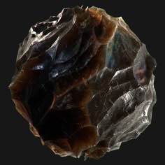 a close up of a rock on a black background