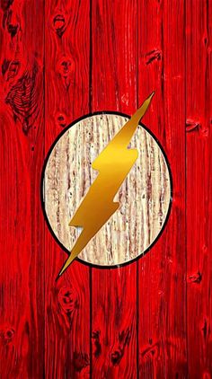 the flash logo on a red wooden background with white circle and gold lightning bolt in center