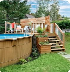 an above ground swimming pool with steps leading up to it and a deck in the background