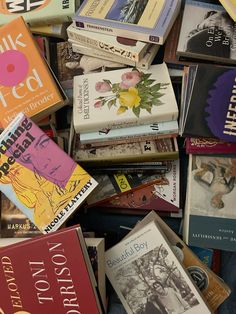 a pile of books sitting next to each other