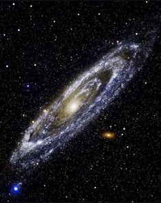the andromidus galaxy with stars in the background