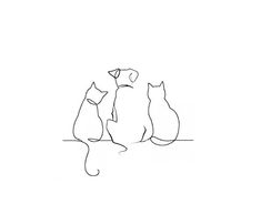 three cats are sitting on the floor and one is looking at something in the distance