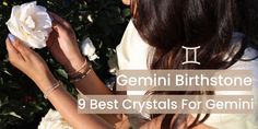 a woman holding a white rose in her hand with the words germini birth stone 9 best crystals for gems