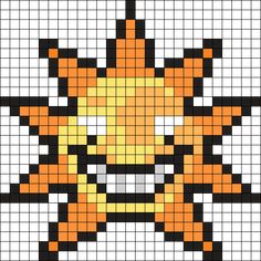 an orange and black cross stitched pattern with the shape of a cat's head
