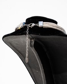 4 ways to style this necklace. (Choker / Collarbone / Twisted / Straight) ROCKNOT engraved hardware. 5" extender for customization. DETAILS Crystal Rhinestone 15" with 5" extender (length shown in photos) 20" with 5" extender Custom Stainless Steel Hardware Brass Extender Chain Rocksoft Cording Designed in Los Angeles Made in China Cords Crafts, Champagne Bubbles, Crystal Sale, Hanging Jewelry, Linen Bag, Purse Strap, Strand Necklace, Multi Strand Necklace, Multi Strand