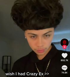 a woman with black hair is looking at the camera and has an emoticive message on her face