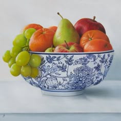 a painting of fruit in a blue and white bowl