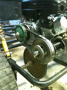 an engine is attached to the back of a vehicle with two wheels and no brake pads