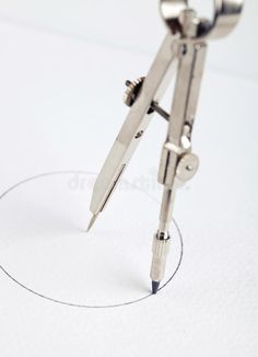 Pair of compasses drawing circle royalty free stock photo