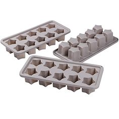 two ice trays with holes in them on a white background, one is empty and the other has an egg shell