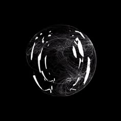 an abstract black and white photo with lines in the shape of a ball on a dark background