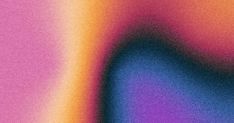 an abstract blurry background with blue, orange and pink colors in the center on top of each other