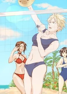 two women in bathing suits are playing volleyball on the beach while another woman stands behind them