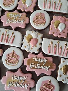 decorated birthday cookies with pink and gold icing