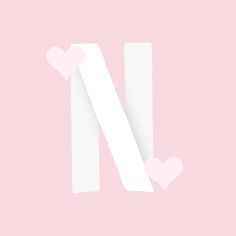 the letter n is made up of two hearts on a pink and white paper background
