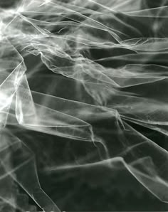 an abstract photo of white and black material