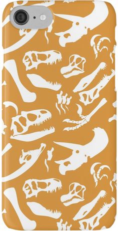 an orange phone case with white skulls and bones on the front, along with other animal heads