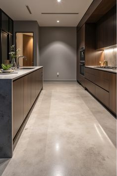 Polished concrete kitchen floor with sleek; modern finish