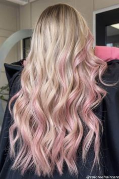15 Blonde Hair With Pink Highlights Styles That Are Insanely Pretty 9 Cotton Candy Pink Highlights, Peekaboo Highlights Blonde Hair, Pastel Pink Blonde, Pink Highligjts, Pink Highlights With Blonde Hair, Blonde Hair Fun Color Ideas, Light Pink With Blonde Hair, Tone Down Blonde Hair, Pinky Blonde Hair